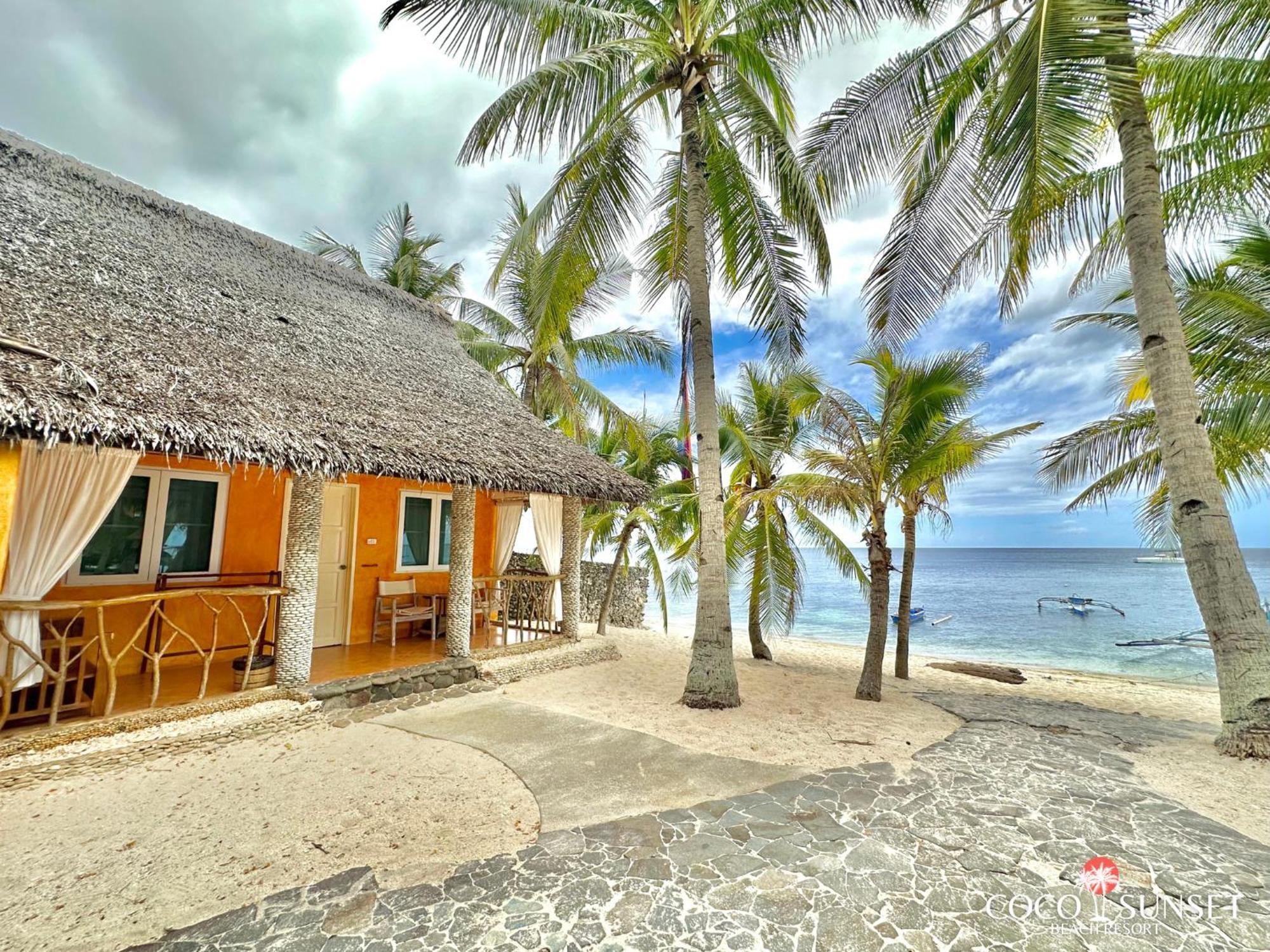 Coco Grove Beach Resort, Siquijor Island Dış mekan fotoğraf A resort in Sabang